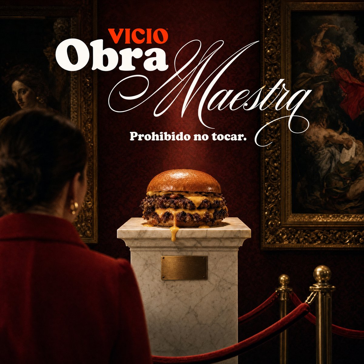 Anuncio de Vicio: una hamburguesa sobre el pedestal de un museo, tras un cordón rojo. «Obra maestra».